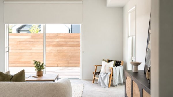 Blockout roller blinds on sliding doors in a Halswell home